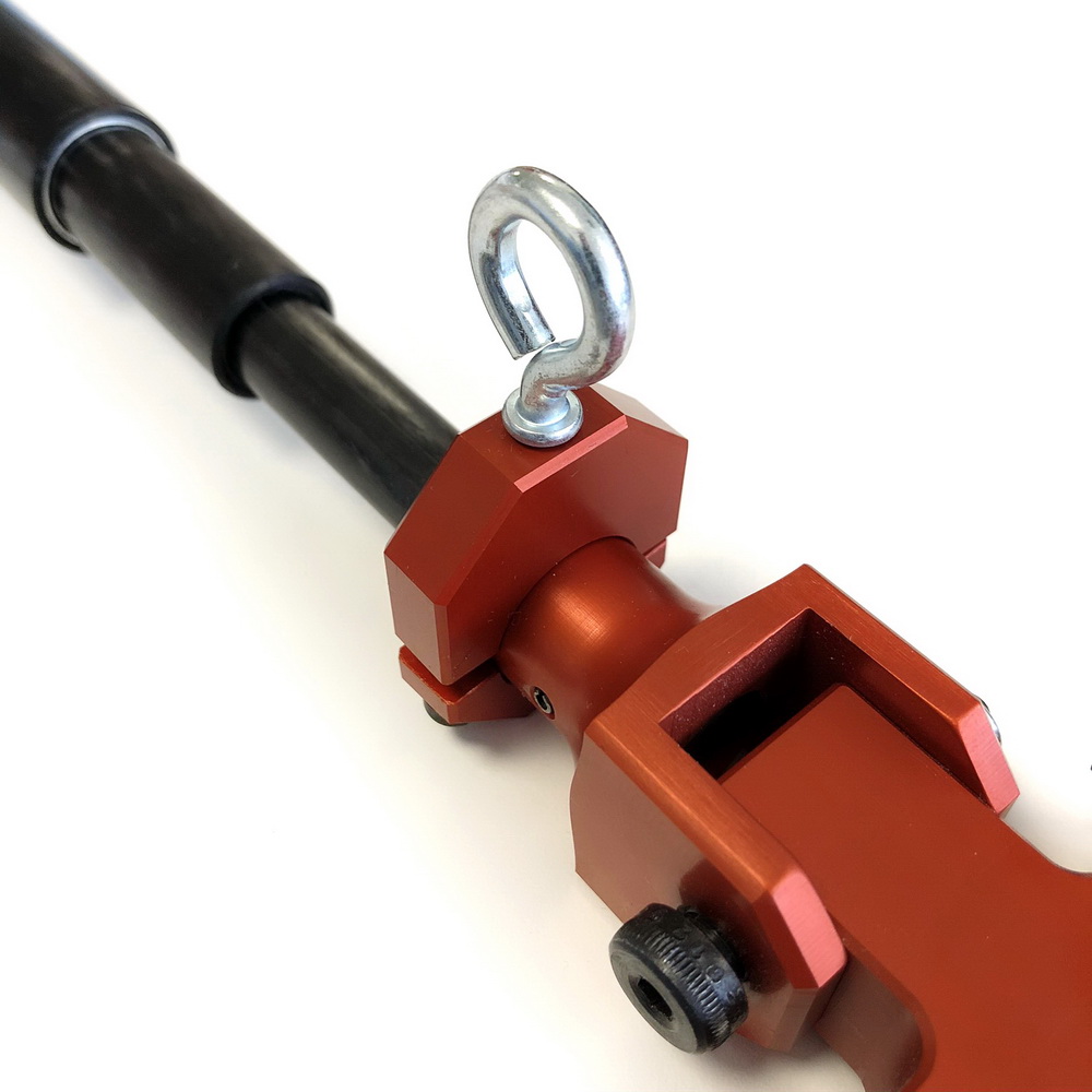 Attached to the clamp holder